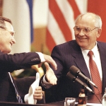 US President George Bush shakes hands with Soviet President Mikhail Gorbachev at the conclusion of their joint news conference ending the one day summit in Helsinki, Finland, September 1990. / AP